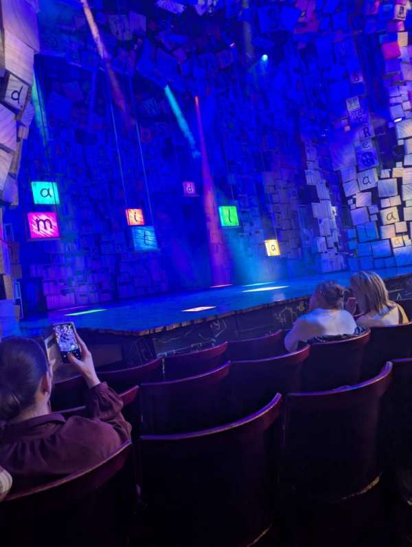 Cambridge Theatre, section: Stalls, row: E, seat: 25