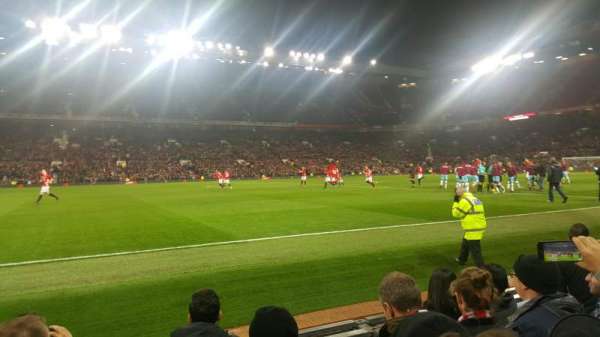 Old Trafford, section: S123, row: EE, seat: 176