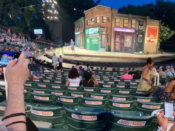 The Delacorte Theater in Central Park, section: G, row: M, seat: 207