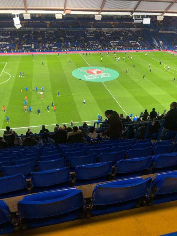 Stamford Bridge, section: East stand upper, row: 26, seat: 128