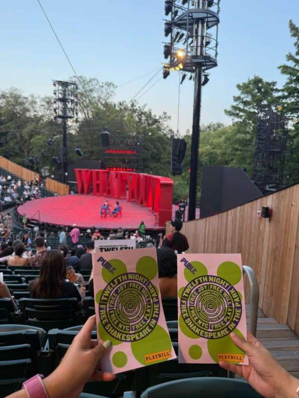 The Delacorte Theater in Central Park, section: F, row: X, seat: 402