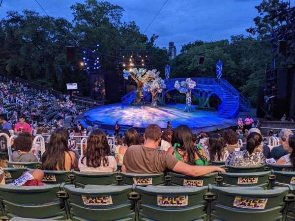 The Delacorte Theater in Central Park, section: G, row: V, seat: 207