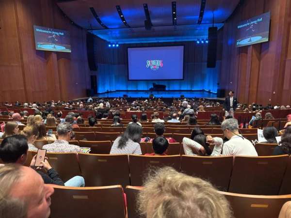 Jones Hall, section: orchestra center middle, row: x, seat: 105