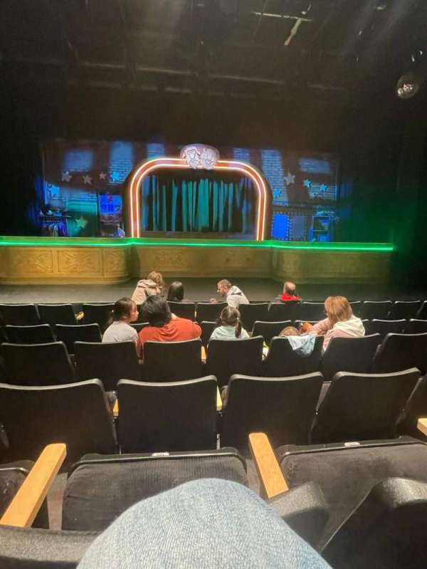 Theater 555, section: S, row: F, seat: 103